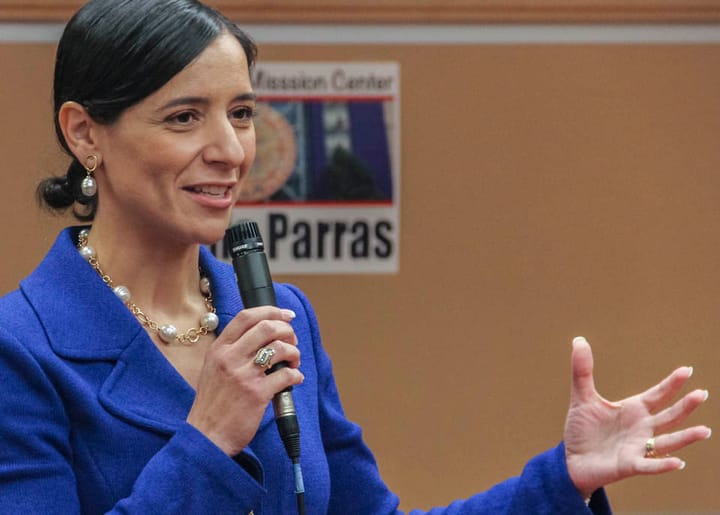 Overflow crowd meets and greets new President of Campus and Centers Virginia Parras