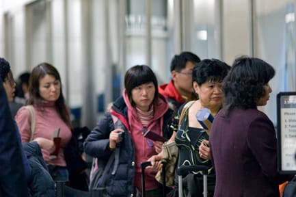 Passengers wait in line for their identification to be checked before proceeding on to the final security checkpoint at the International Terminal at the San Francisco International Airport on Jan. 21. CHLOE ASHCRAFT / THE GUARDSMAN