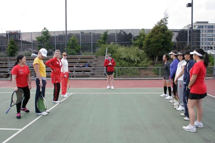 Head coach kelly Hickey (center) instructs her team during practice on Feb. 5. JOSEPH PHILLIPS / THE GUARDSMAN