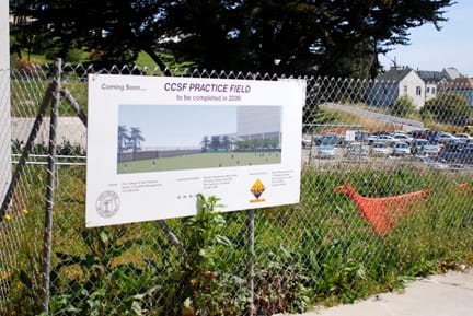 A sign stating the completion of a field in fall 2009 currently hangs in front of the future construction site adjacent to Batmale Hall. RAMSEY EL-QARE / THE GUARDSMAN 
