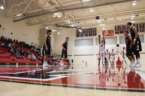 San Francisco Rams freshman guard Vincent Golson (20) takes a shot while falling against the Ohlone College Renegades in a CCCAA men’s basketball game on Ocean campus, Friday, Feb. 22, 2014. The Rams won the game 71-63, finishing the regular season 12-0 undefeated. They won the Coast-North Conference title and will compete in playoffs next week. Photo by Santiago Mejia/The Guardsman