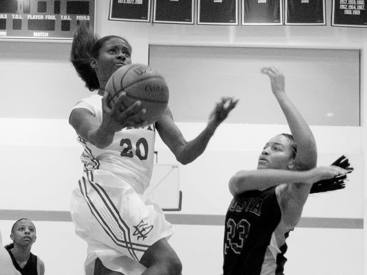  Rams sophomore guard Franeka Hall (20) lays up a shot against Contra Costa College during a CCCAA women’s playoff basketball game on Saturday, March 1, 2014, at Ocean campus. Photo by Khaled Sayed/The Guardsman