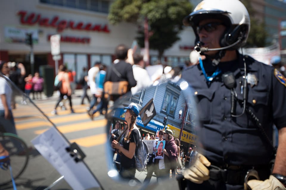 Friends, family and community members march from the Alex Nieto Memorial at Bernal Heights Park to  The Phillip Burton Federal Building & United States Courthouse at 450 Golden Gate Avenue in San Francisco to honor Alex Nieto on the 5-month anniversary of his death on Aug. 22, 2014. (Photo by Nathaniel Y. Downes)