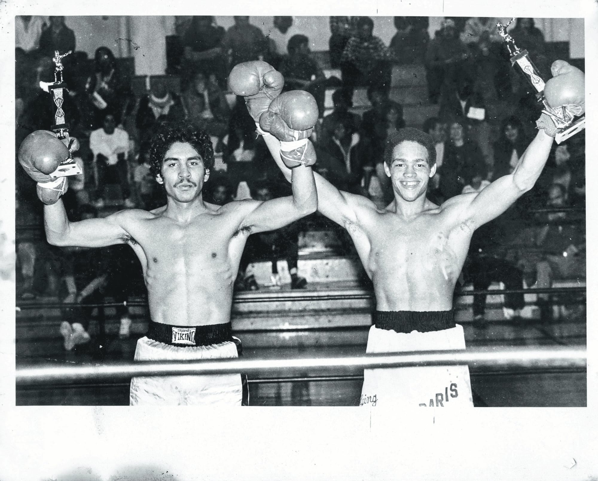 Paris Alexandar (right) celebrates a City College boxing exhibition victory in 1984. (Photo courtesy of Paris Alexander) 