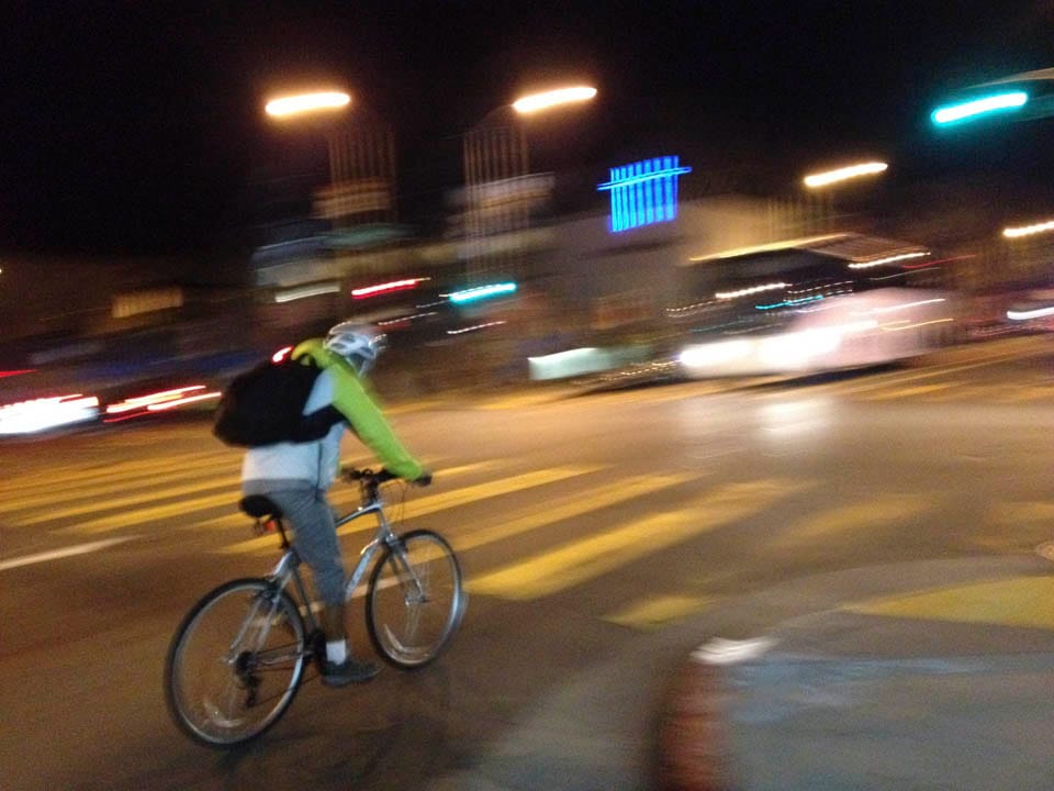 A man ride his bicycle on Valencia Street, Oct. 27, 2014. (Photo by Khaled Sayed)