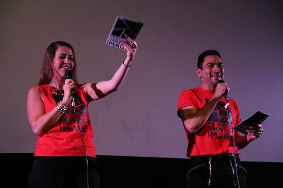City College Cinema Department members Jessica Kenney, left, and Carlos Sandoval, right, giving introductory announcements at the 4th annual “Festival of the Moving Image” screening. Nov.19. (Photo by Natasha Dangond)