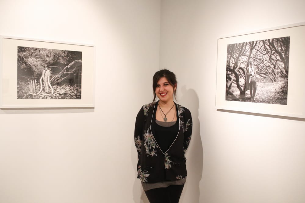 City College photography student Amanda Aceves at the opening reception of her black and white photo exhibition “Dreamscapes,” shot entirely on a 4x5 large format film camera, Gallery Obscura on Ocean Campus, Monday, Feb. 9. (Photo by Natasha Dangond)