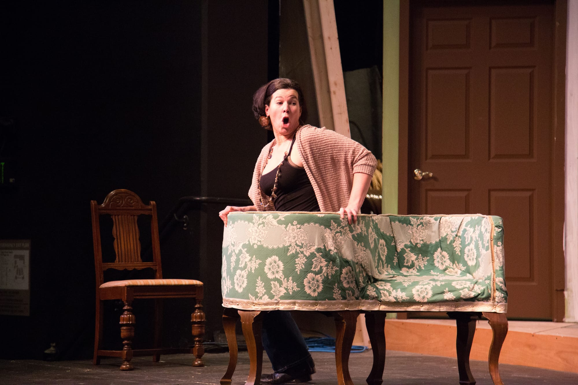 Cast member Genevieve Perdue rehearsing as her character, “Raymonde”, dur- ing a dress rehearsal for “A Flea in Her Ear.”