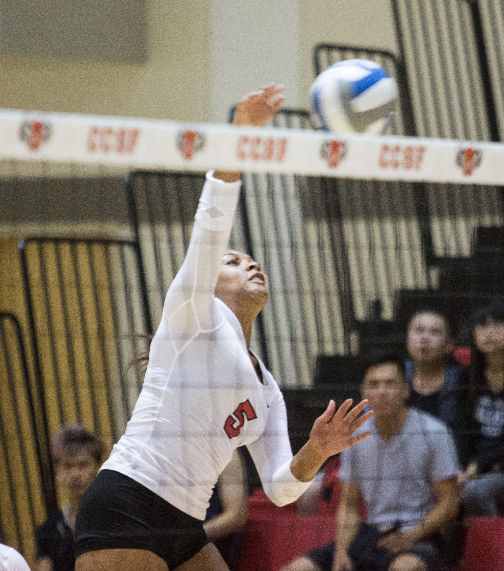 City College Freshman Kijana Best (5) hits the ball across the net and scores a point against West Valley College on Thursday, Oct. 15. (Photo by Khaled Sayed/The Guardsman)