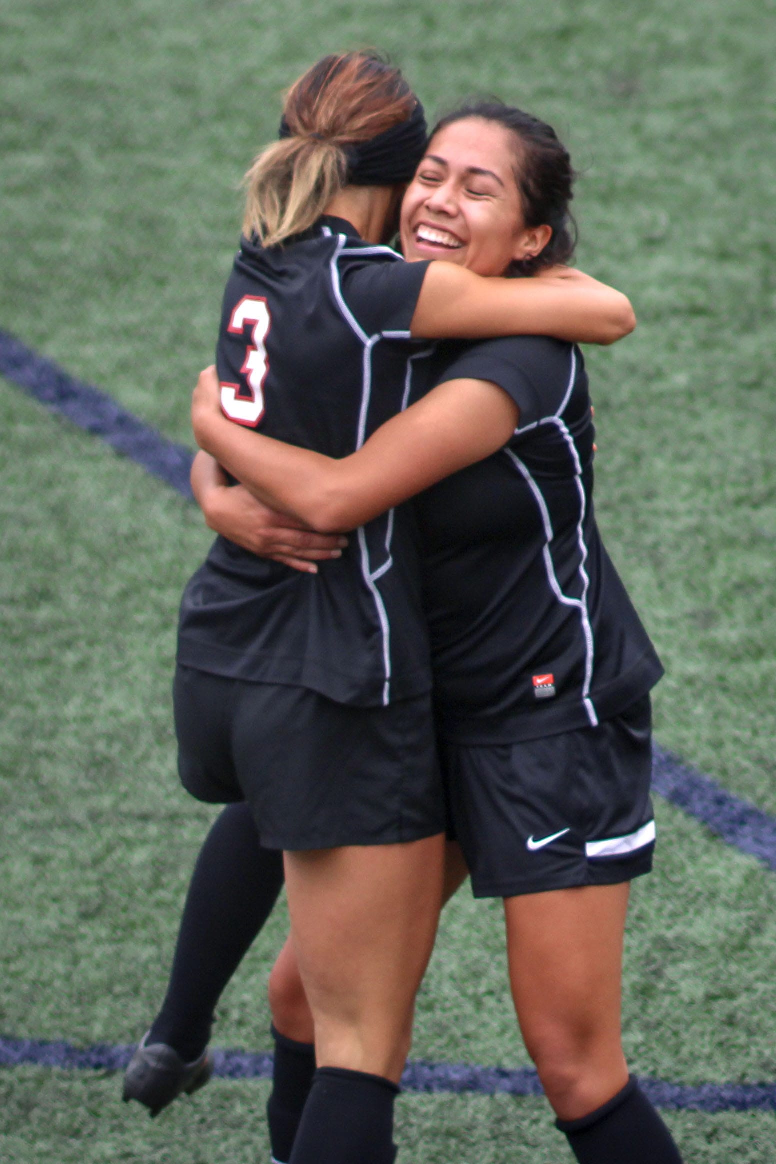 Rams sophomore defender Valentina Camacho Arias (3) hugs Denise Hernandez (6) after Arias scored a goal against Cañada College giving the Rams a 2-1 lead during the first half of a CCCAA women’s soccer match at Ocean Campus, on Tuesday Oct. 27, 2015. (Photo by Santiago Mejia/ The Guardsman)