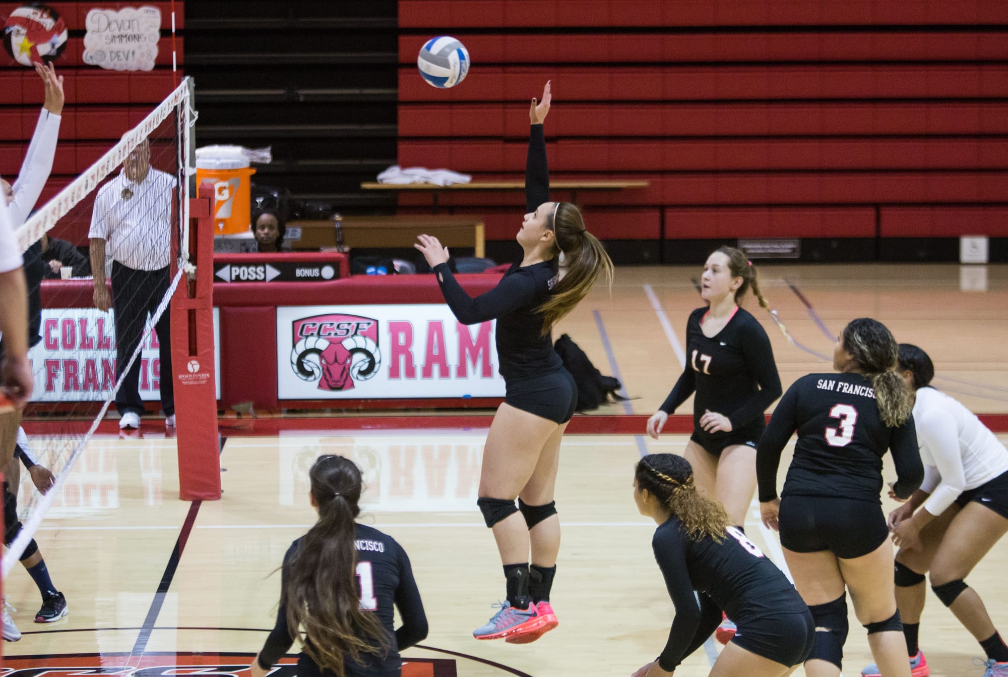 City College’s Sifagatogo Faaiu (7) receives the ball from a Monterey Peninsula College player at City College court at Ocean, Nov 13 ( Khaled Sayed