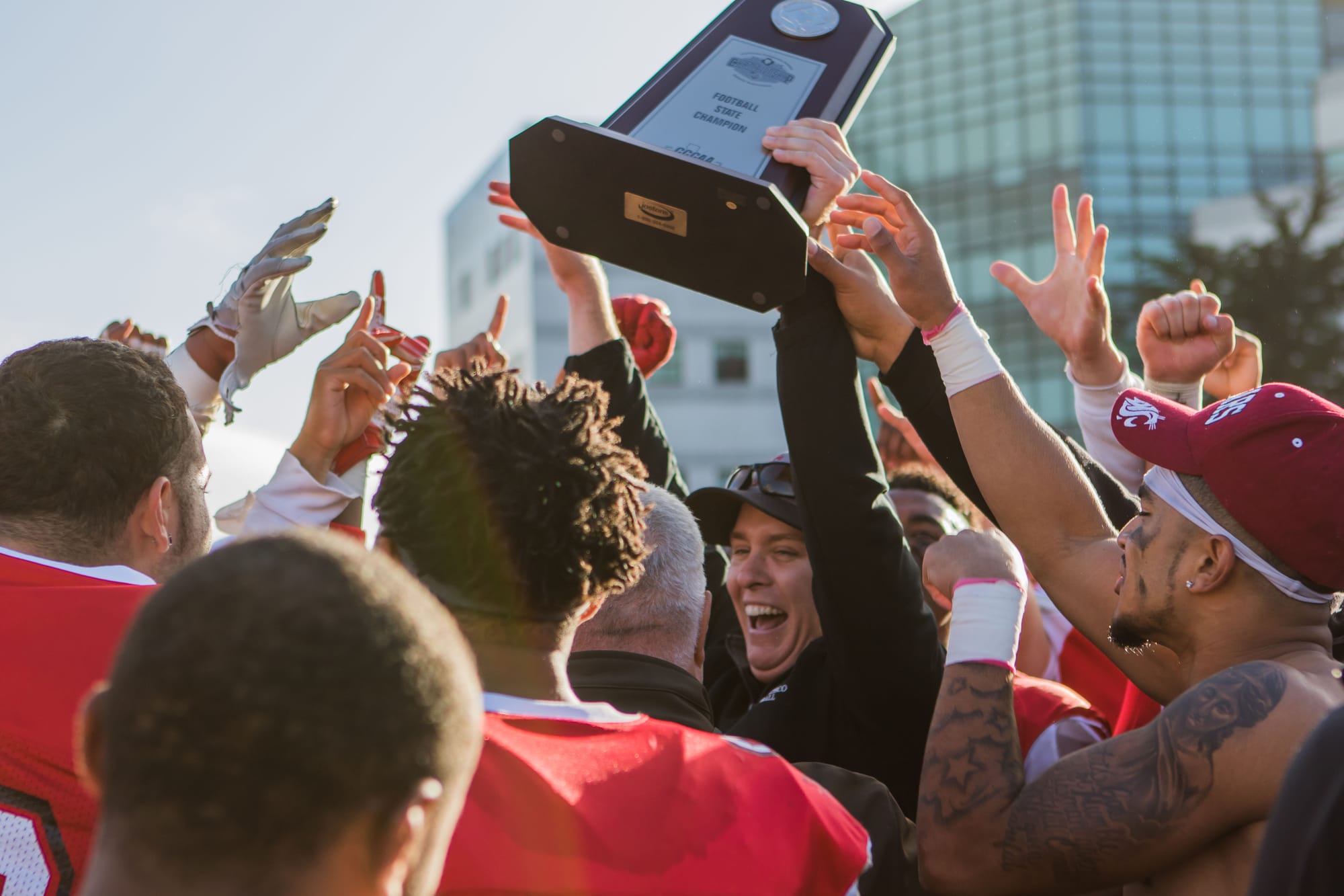 Coach Jimmy Collins shares the joy with the team. (Photo by Peter Wong / The Guardsman) 