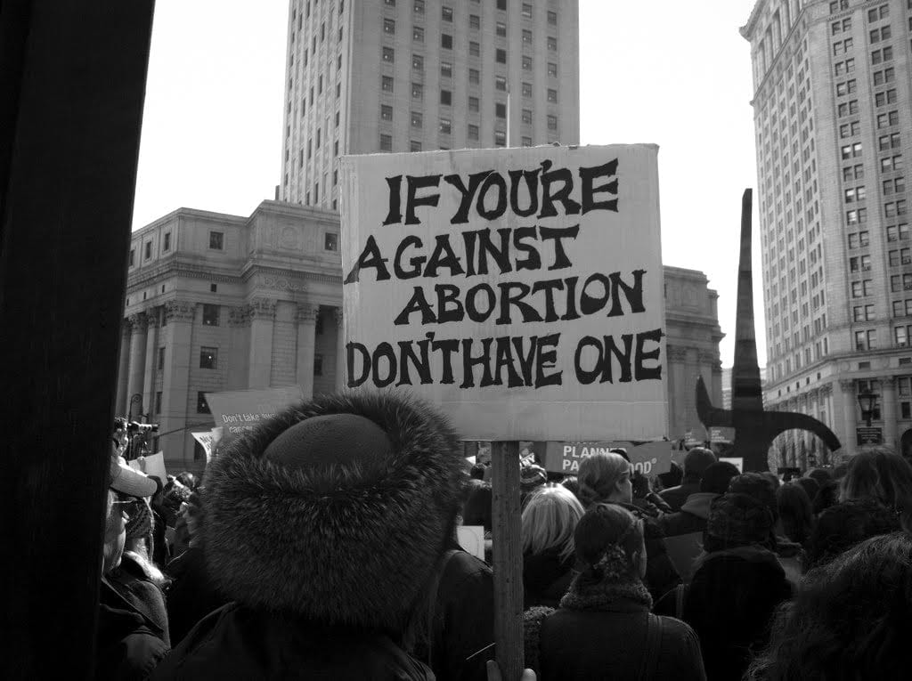 Activists rally for a New York City planned parenthood demonstration. (Photo by Flickr user “Citizen Bob”)