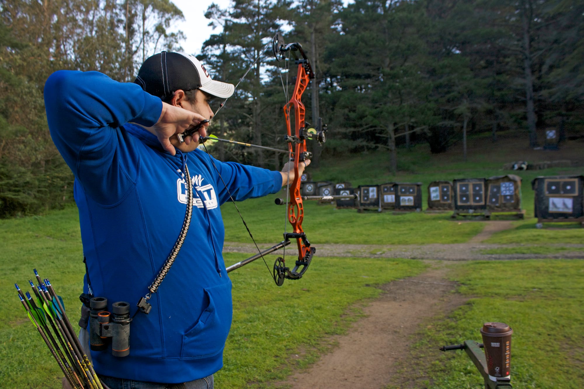 Rudy Sandoval Jr. aims for the target at the San Francisco Archery Range in Pacifica on March 25, 2016. (Photo by Cassie Ordonio/ The Guardsman)