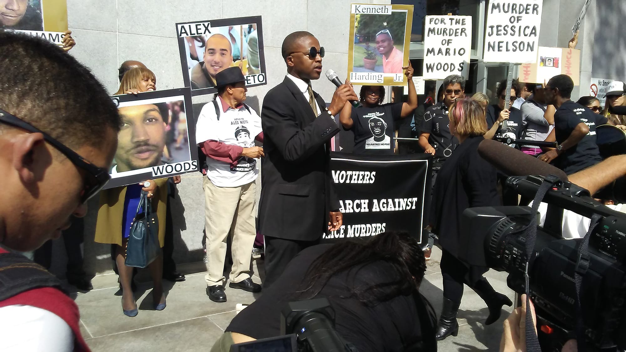 Daniel Muhammad from the Mario Woods Coalition speaks to the crowd about police brutality outside the Hall of Justice on Oct. 7, 2016 (Photo by Nigel Flores/Special to The Guardsman).