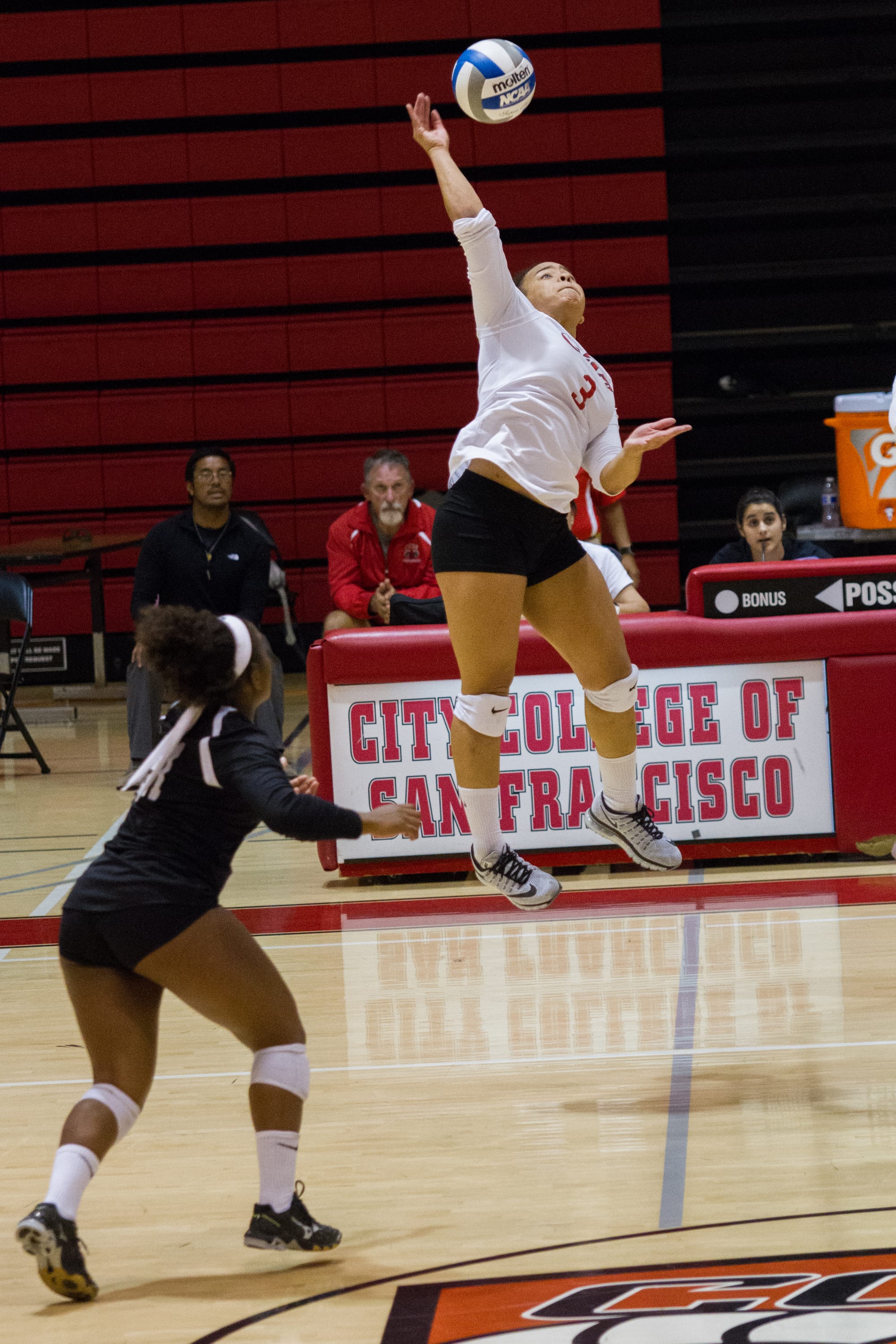 Rams freshman Jennifer Quarters-Styles returns a hit during the second set against Cabrillo College at the Brad Duggan gymnasium on September 30, 2016. Photo by Franchon Smith/The Guardsman