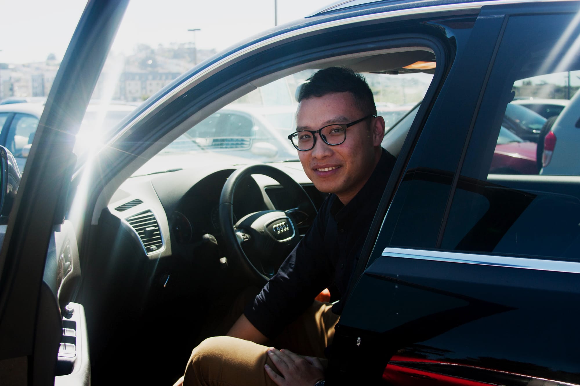 “I don’t usually park down there, in the morning  I park in the back behind the bungalow so it would not affect my normal school days.” Photo caption: River (freshman)  leans out of his audi as he gets ready to depart to class. 