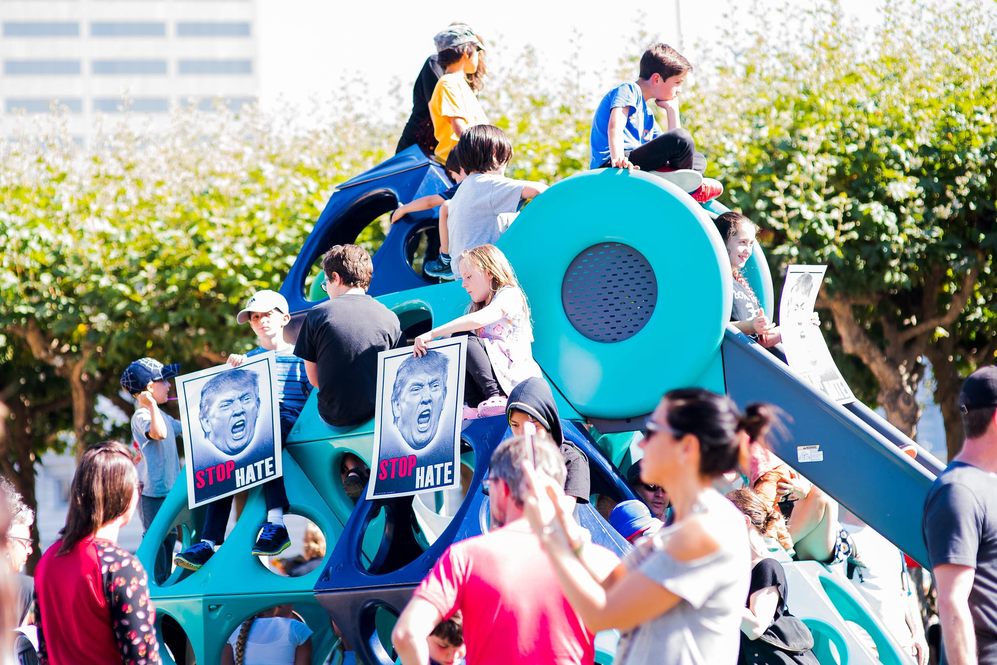 Children of demonstrators on play structure before City Hall at counter-demonstration. Photo taken on Aug 26, 2017 by Otto Pippenger.