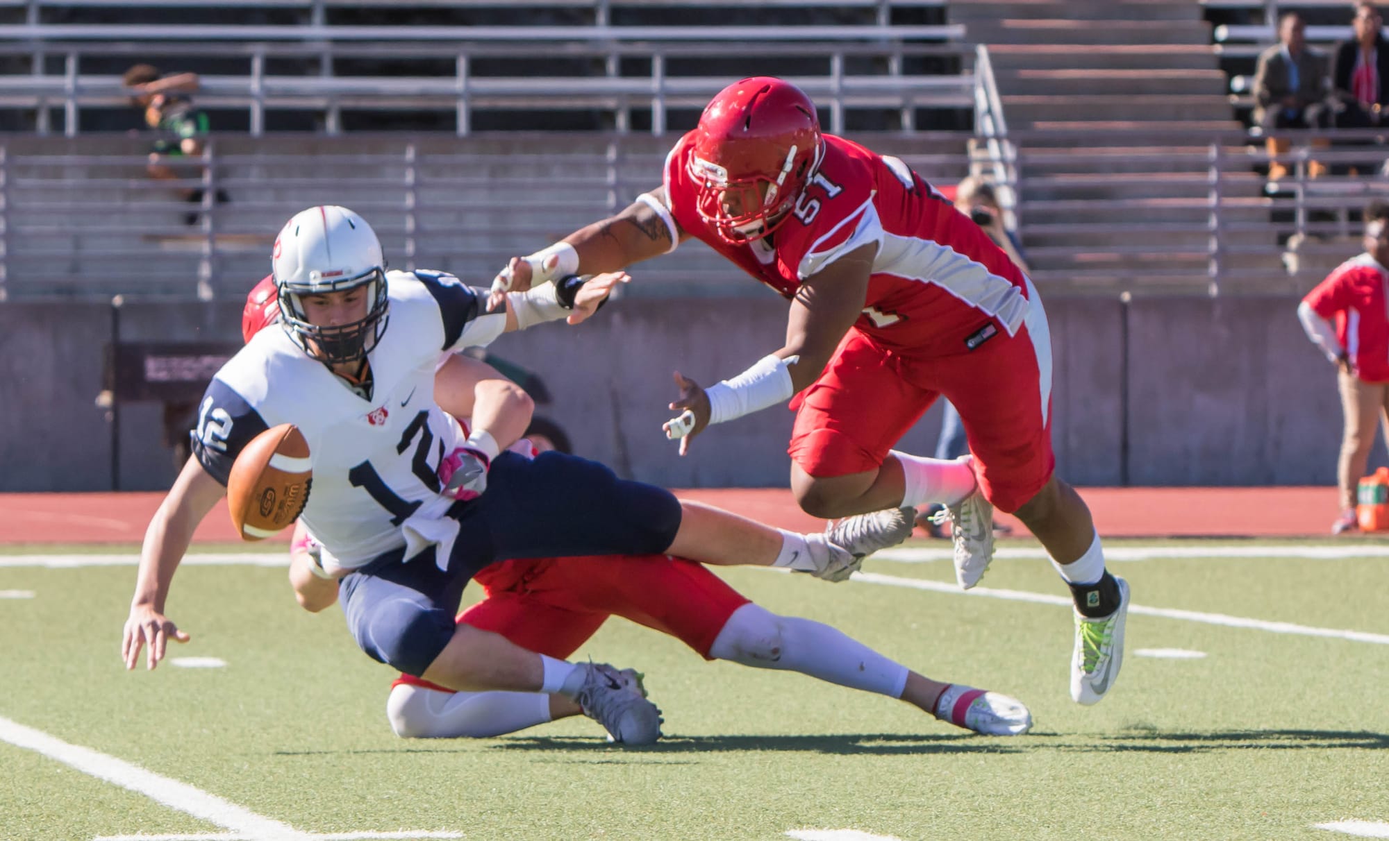 Defensive end Tavai Tuitasi (#51) dives after a fumble on Saturday, Oct. 21, 2017. San Francisco. Photo by Peter Wong