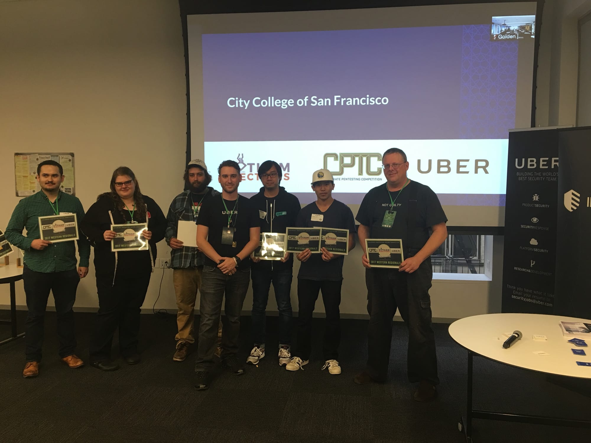 City College’s Ethical Hacking Team spent the day in a hot hotel room competing using six Macbook Pros. They placed second at the CPTC Western Regional Competition. From left to right are competitors, Tom Horvath, Elizabeth Biddlecombe, Stuart Morris, Alex Levinson who served as the event organizer, Tim Ip, Andrew Mei and Coach Sam Bowne. 