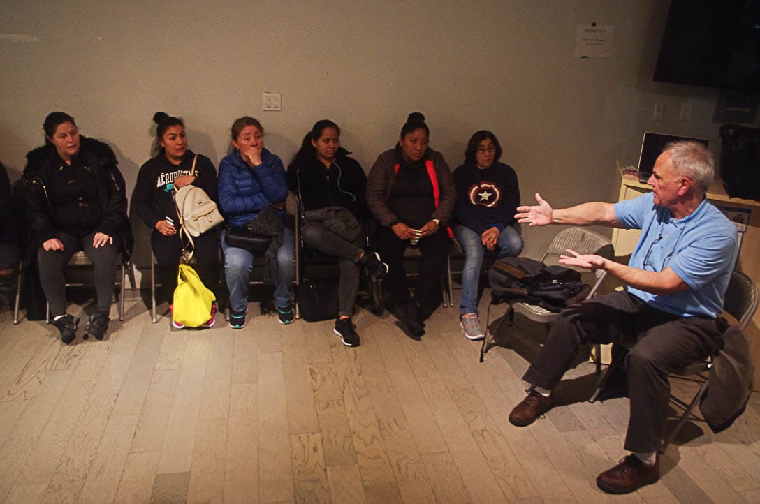 La Colectiva de Mujeres gather at the office of the Day Labor Program to plan their protest of the cancellation of the labor studies class Working Tales, on Jan. 22. Photo by Victor Tence. 