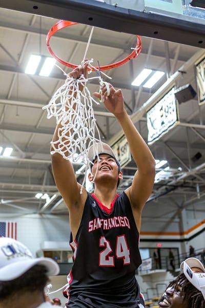After defeating San Diego City College, the Rams' sophomore guard Michael Wright (#55), forward Lewis Hayes (#34), freshman guard Niamey Harris (#3), sophomore Ben Borja (#24), and Head Coach Justin Labagh are hoisted for the ceremonial cutting of the net on March 13, 2018. Photos by Felix Cortez/Special to The Guardsman.