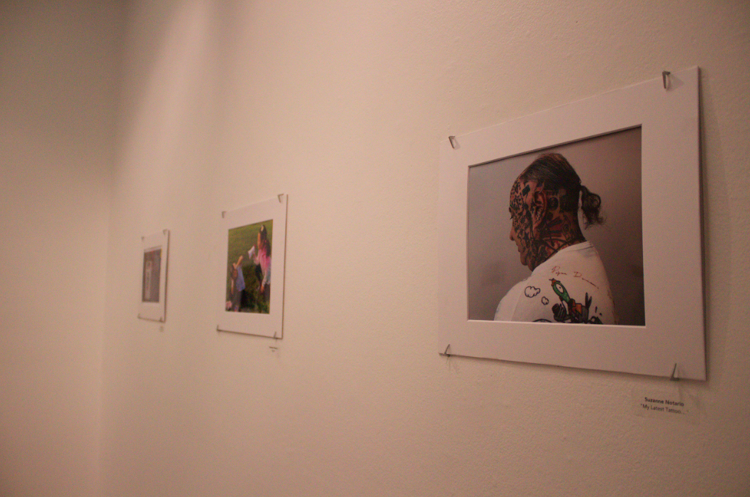 Photos hang on the wall of the Obscura Gallery in the Photography Department. Photo by Corey Holt/Special to The Guardsman.