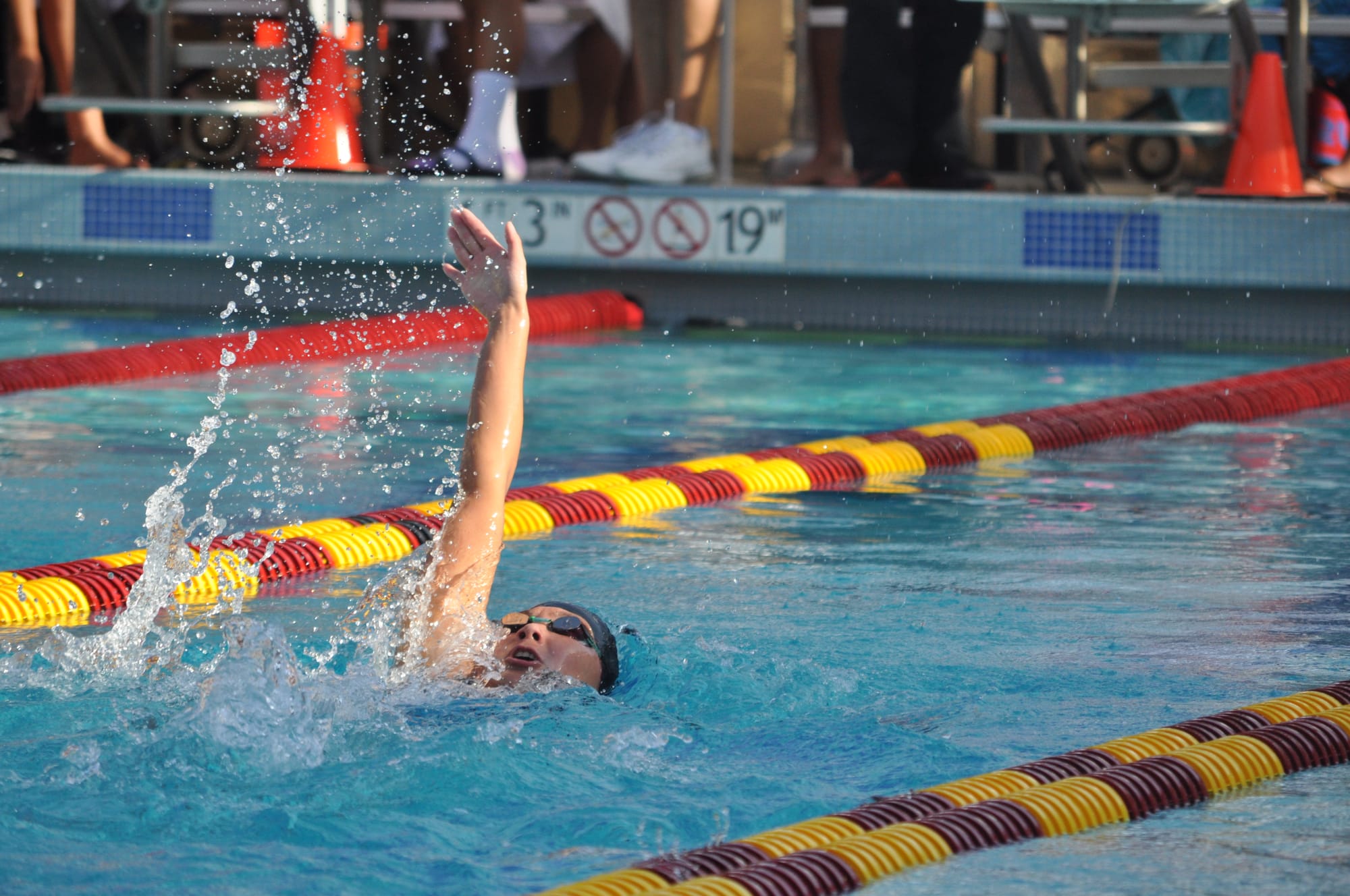 Alika lew-Koga during 100 Yard Backstroke event at De Anza College on May 4, 2018. Photo by Peter J. Suter/The Guardsman.