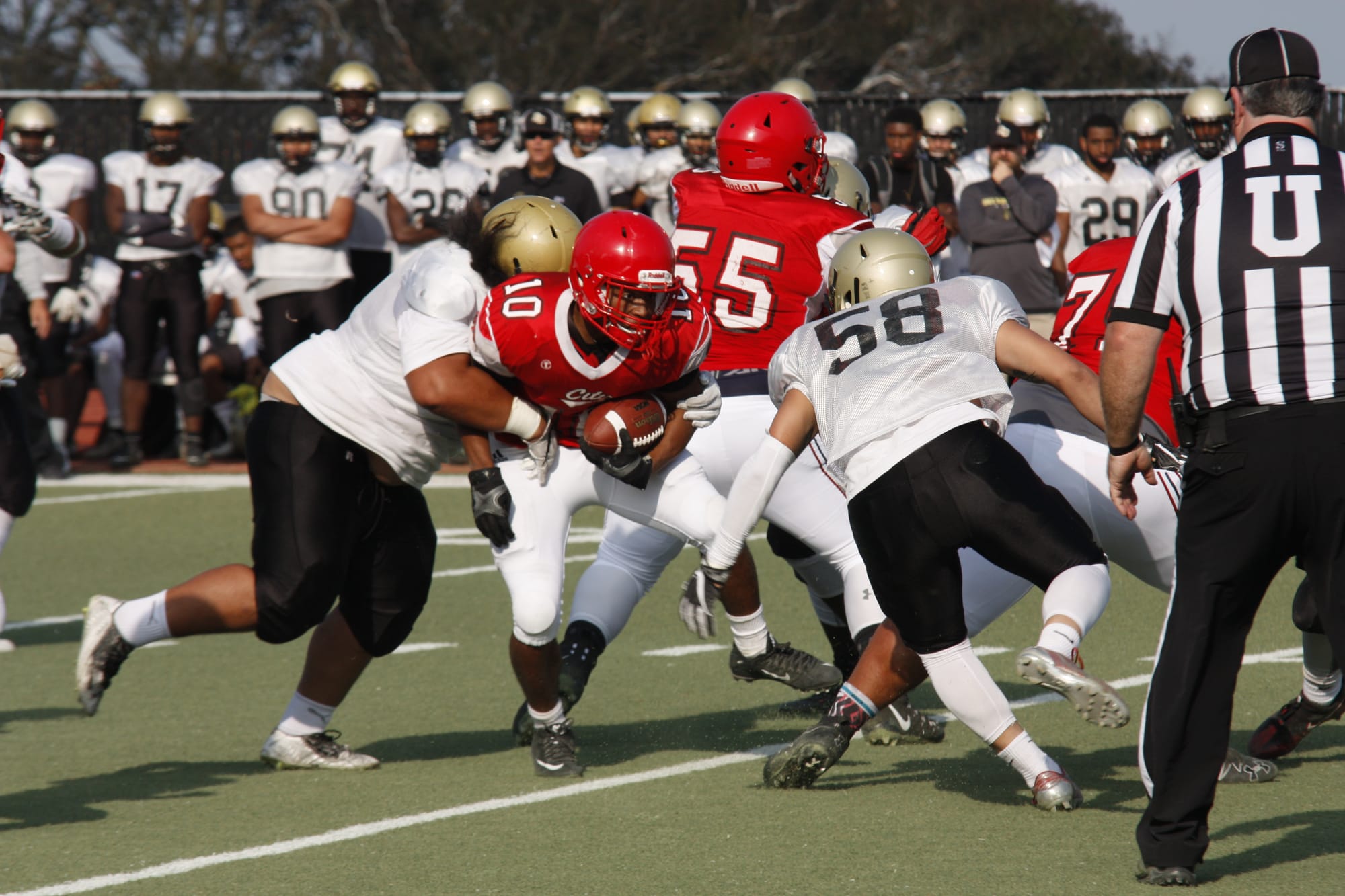 The Rams sophmore running back Deshawn Collins (#10) doesn't go donwn easlly against San Juan Delta College on Wednesday, August 22, 2018. Photo Peter J. Suter/ The Guardsman